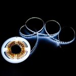 Cool white LED strip light roll with flexible adhesive backing for under cabinet, cove, accent, display, and indoor architectural lighting.